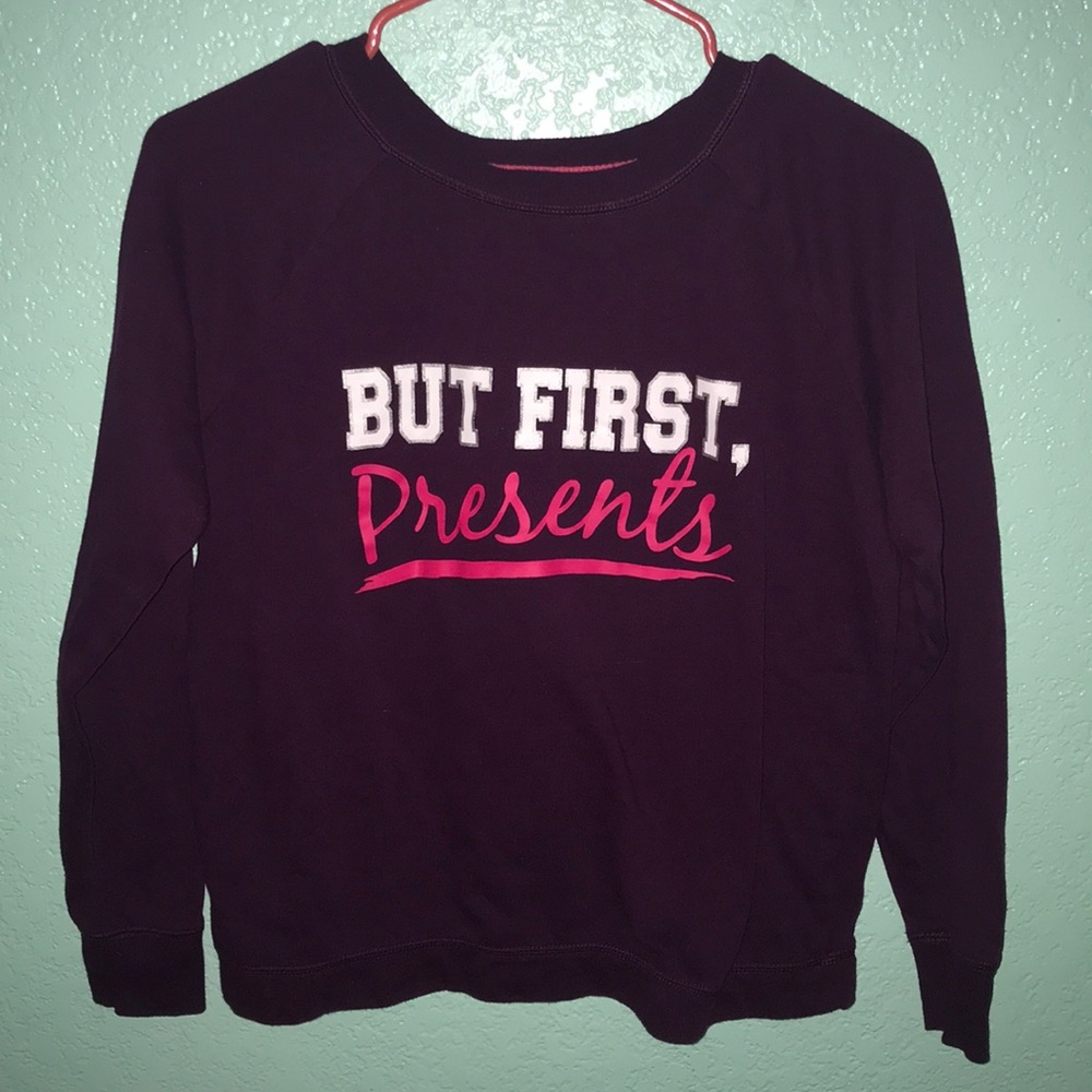 But first, presents pajama shirt or sweater.
